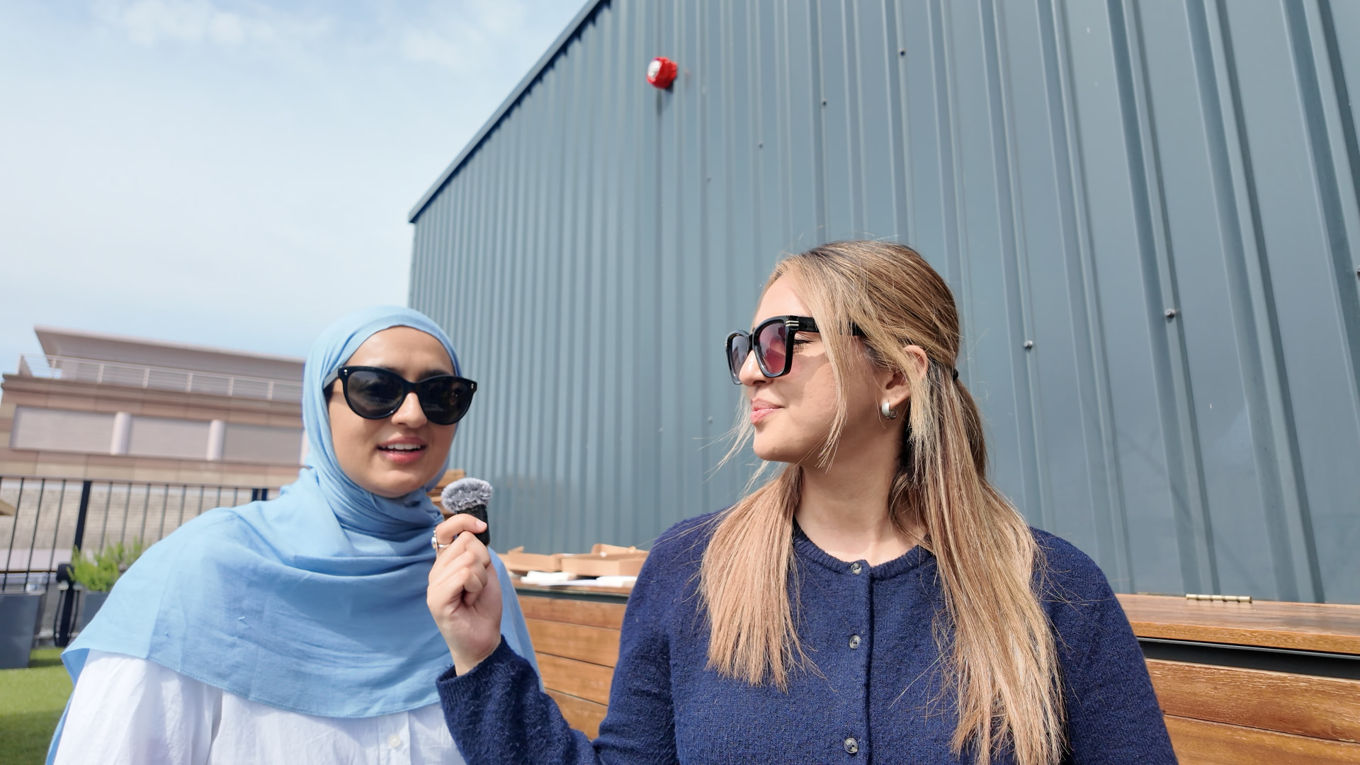 Zara interviewing a founder on camera at a tech event in London